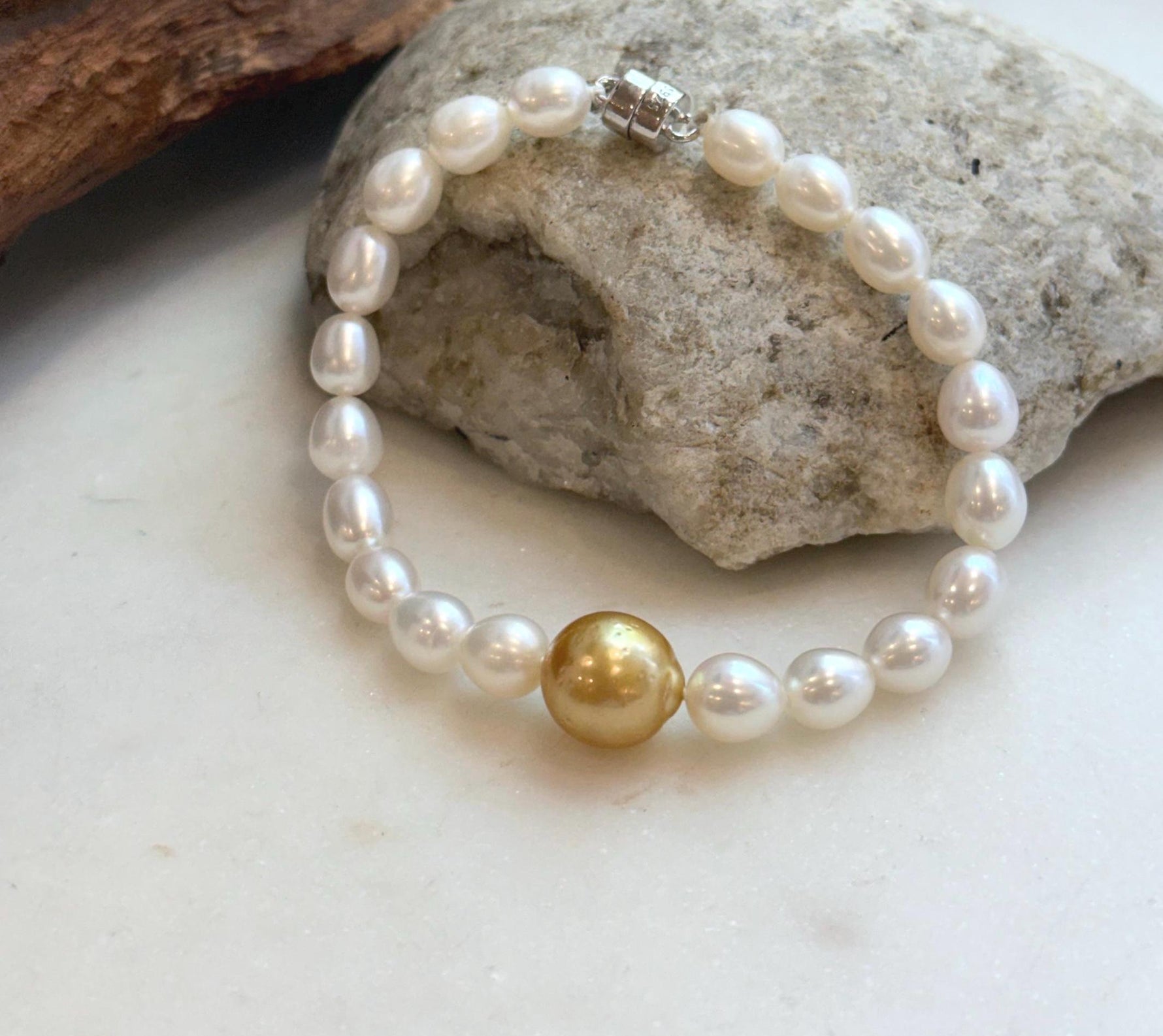 Elly’s 11.2mm South sea deep tea golden Freshwater Pearls Bracelet: Extreme luster mirrored, S925 silver Bracelet. Knotted 7.5”.