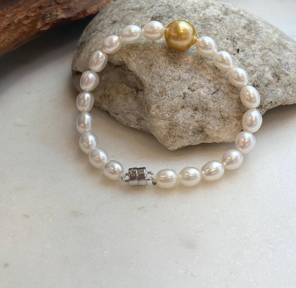 Elly’s 11.2mm South sea deep tea golden Freshwater Pearls Bracelet: Extreme luster mirrored, S925 silver Bracelet. Knotted 7.5”.