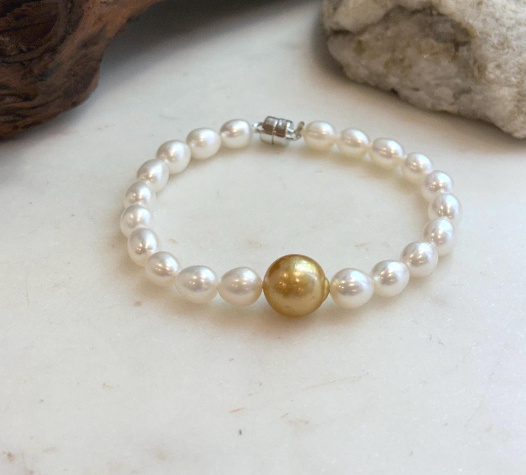 Elly’s 11.2mm South sea deep tea golden Freshwater Pearls Bracelet: Extreme luster mirrored, S925 silver Bracelet. Knotted 7.5”.