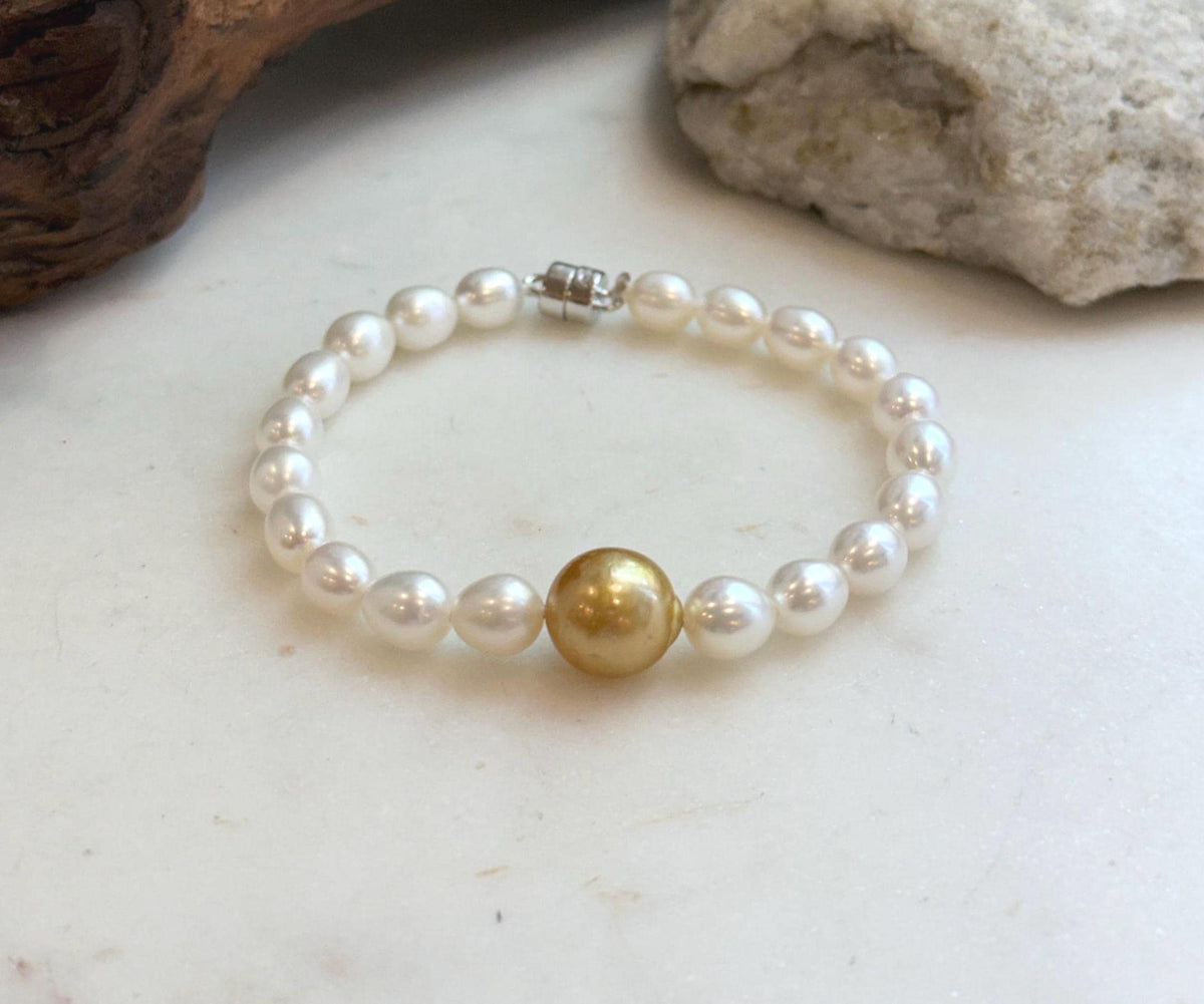 Elly’s 11.2mm South sea deep tea golden Freshwater Pearls Bracelet: Extreme luster mirrored, S925 silver Bracelet. Knotted 7.5”.
