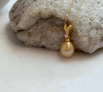 Elly’s 10mm South Sea deep Gold iridescent ocean Pearl pendant: Extreme luster mirrored, 2.2cm high, S925 silver w/ gold plated pendant.