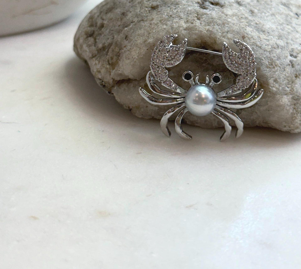 Elly’s 8.9mm Akoya ocean pearl Crab brooch: Extreme luster mirrored, 3.7x3cm, no chain.