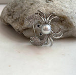 Elly’s 8.9mm Akoya ocean pearl Crab brooch: Extreme luster mirrored, 3.7x3cm, no chain.