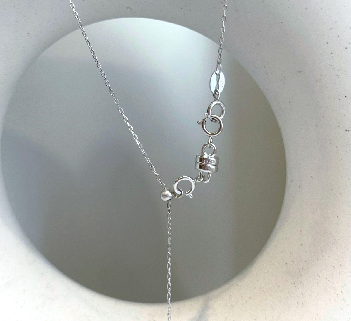 Elly’s 12mm Tahitian platinum ocean Pearl pendant: Extreme luster mirrored, S925 silver minimalist pendant, 2.1cm high.