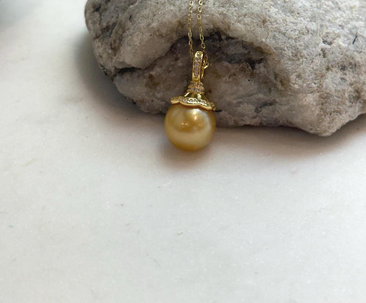 Elly’s 12.6mm South Sea deep Gold ocean Pearl pendant: Extreme luster mirrored, 2.4cm high, S925 silver w/ gold plated pendant.