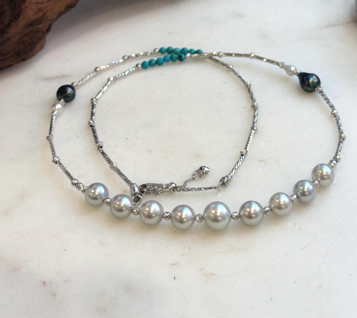 Elena Elly’s 9pcs 7.1-8.5mm Akoya ocean pearls Designed Necklace: Extreme luster mirrored, S925 silver necklace, to 21.3”.