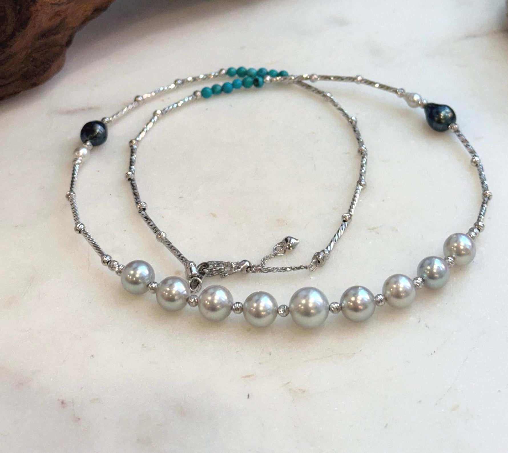 Elena Elly’s 9pcs 7.1-8.5mm Akoya ocean pearls Designed Necklace: Extreme luster mirrored, S925 silver necklace, to 21.3”.
