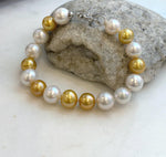 Elly’s 17pcs 10.2-11.5mm White golden Edison Pearls Bracelet: Extreme luster mirrored, 8.3” knotted, S925 silver Bracelet.