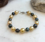 Elly’s 8.3-11mm 17pcs Genius South sea golden Tahitian Ocean Pearls bracelet: Extreme luster, 8.2”, S925 silver bracelet.