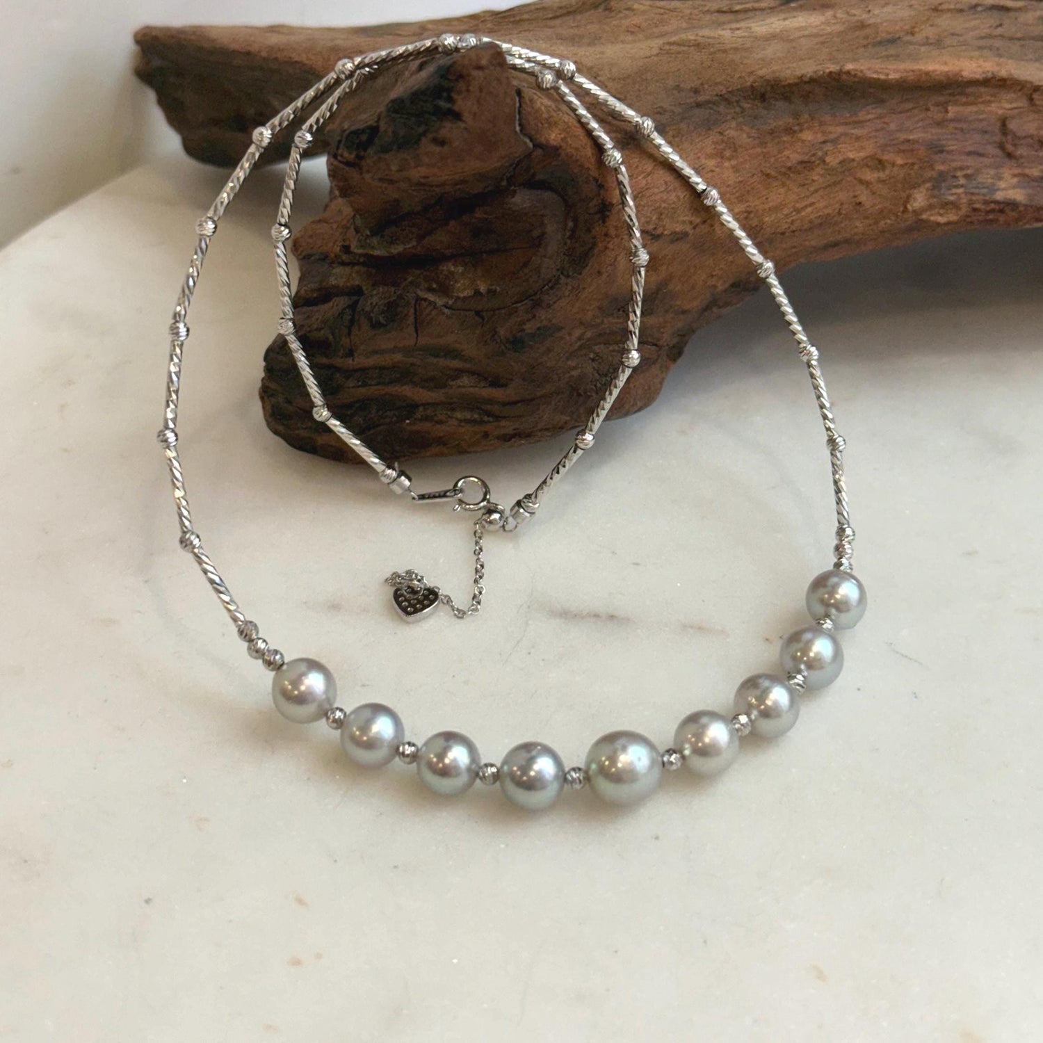 Elly’s 9pcs 7.2-8.1mm Akoya ocean pearls Designed Necklace: Extreme luster mirrored, S925 silver necklace, to 19.5”.