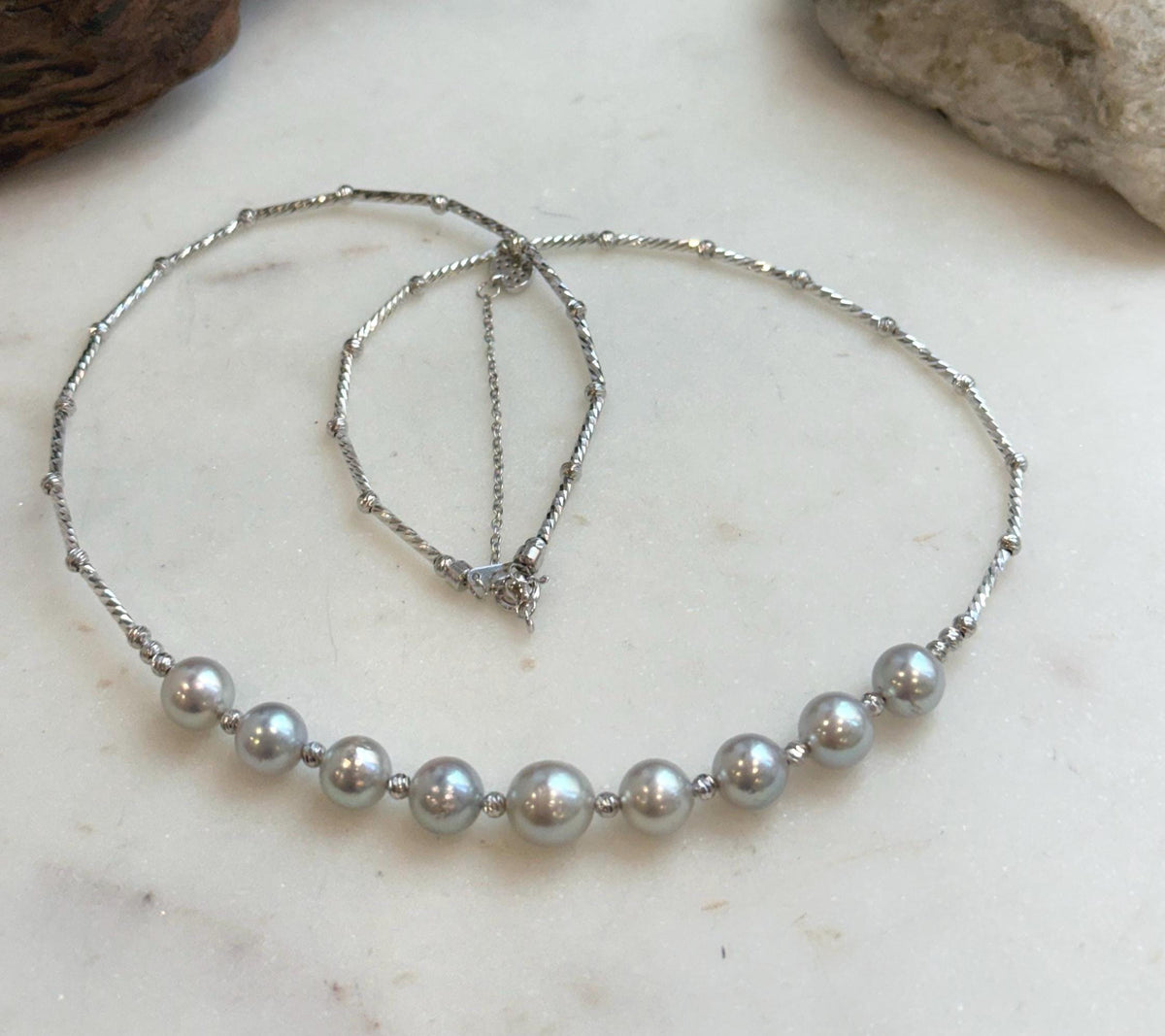 Elly’s 9pcs 7.2-8.1mm Akoya ocean pearls Designed Necklace: Extreme luster mirrored, S925 silver necklace, to 19.5”.