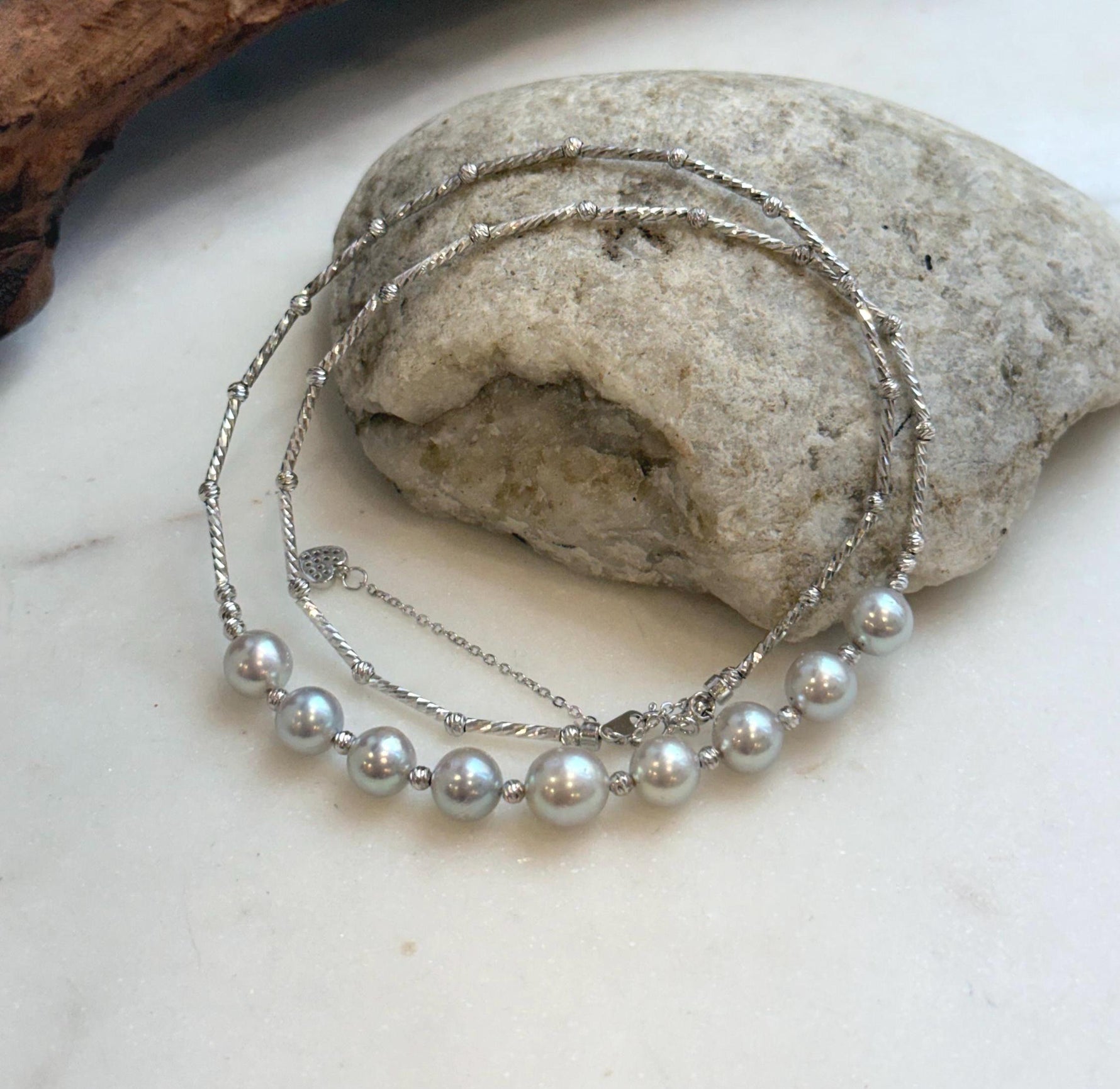 Elly’s 9pcs 7.2-8.1mm Akoya ocean pearls Designed Necklace: Extreme luster mirrored, S925 silver necklace, to 19.5”.