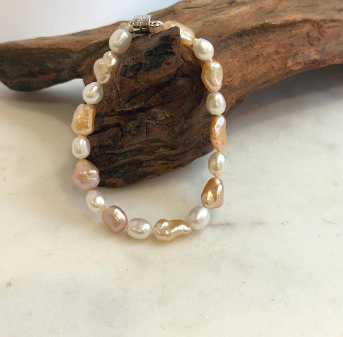 Elly’s 6.6-8.5mm Freshwater Multicolored Pearls Bracelet: Extreme luster mirrored, 7.8”, S925 silver bracelet.