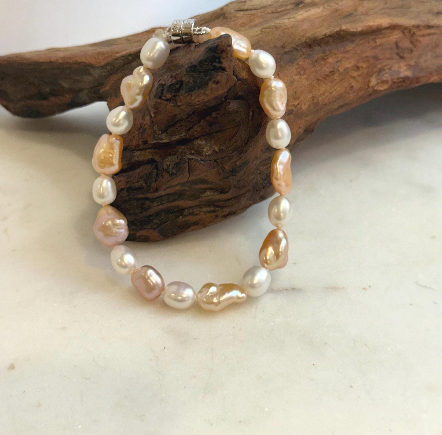 Elly’s 6.6-8.5mm Freshwater Multicolored Pearls Bracelet: Extreme luster mirrored, 7.8”, S925 silver bracelet.