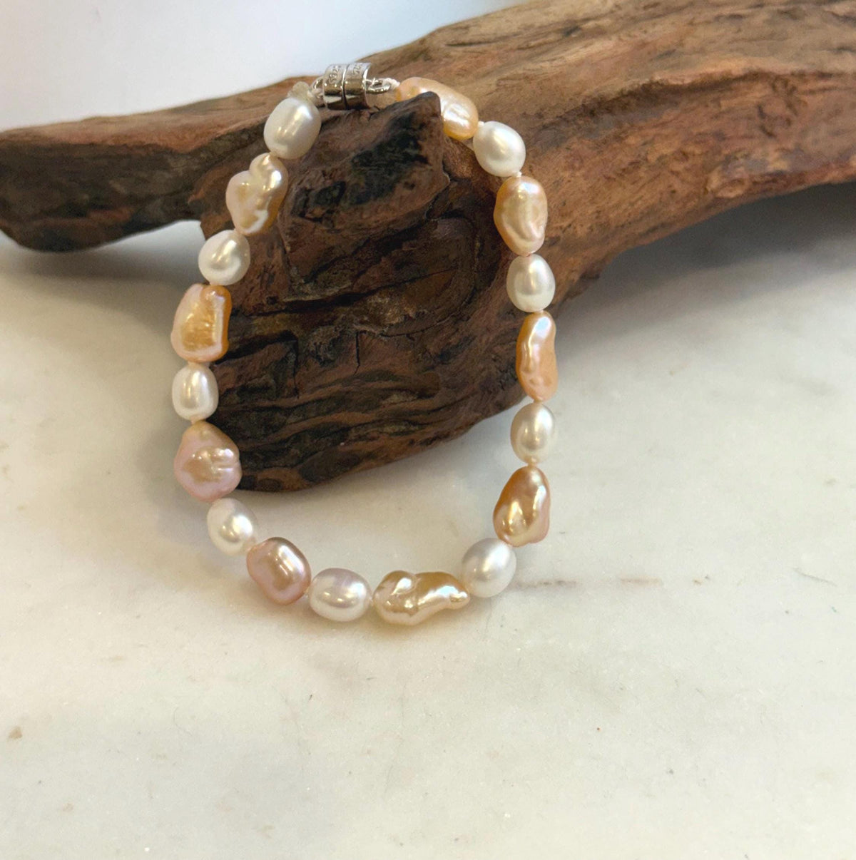 Elly’s 6.6-8.5mm Freshwater Multicolored Pearls Bracelet: Extreme luster mirrored, 7.8”, S925 silver bracelet.