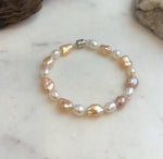 Elly’s 6.6-8.5mm Freshwater Multicolored Pearls Bracelet: Extreme luster mirrored, 7.8”, S925 silver bracelet.