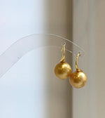 Elly’s 11.2mm Genius South sea deep golden ocean Pearls Earrings hooks: Extreme luster mirrored, 2.2cm high, S925 silver earrings.
