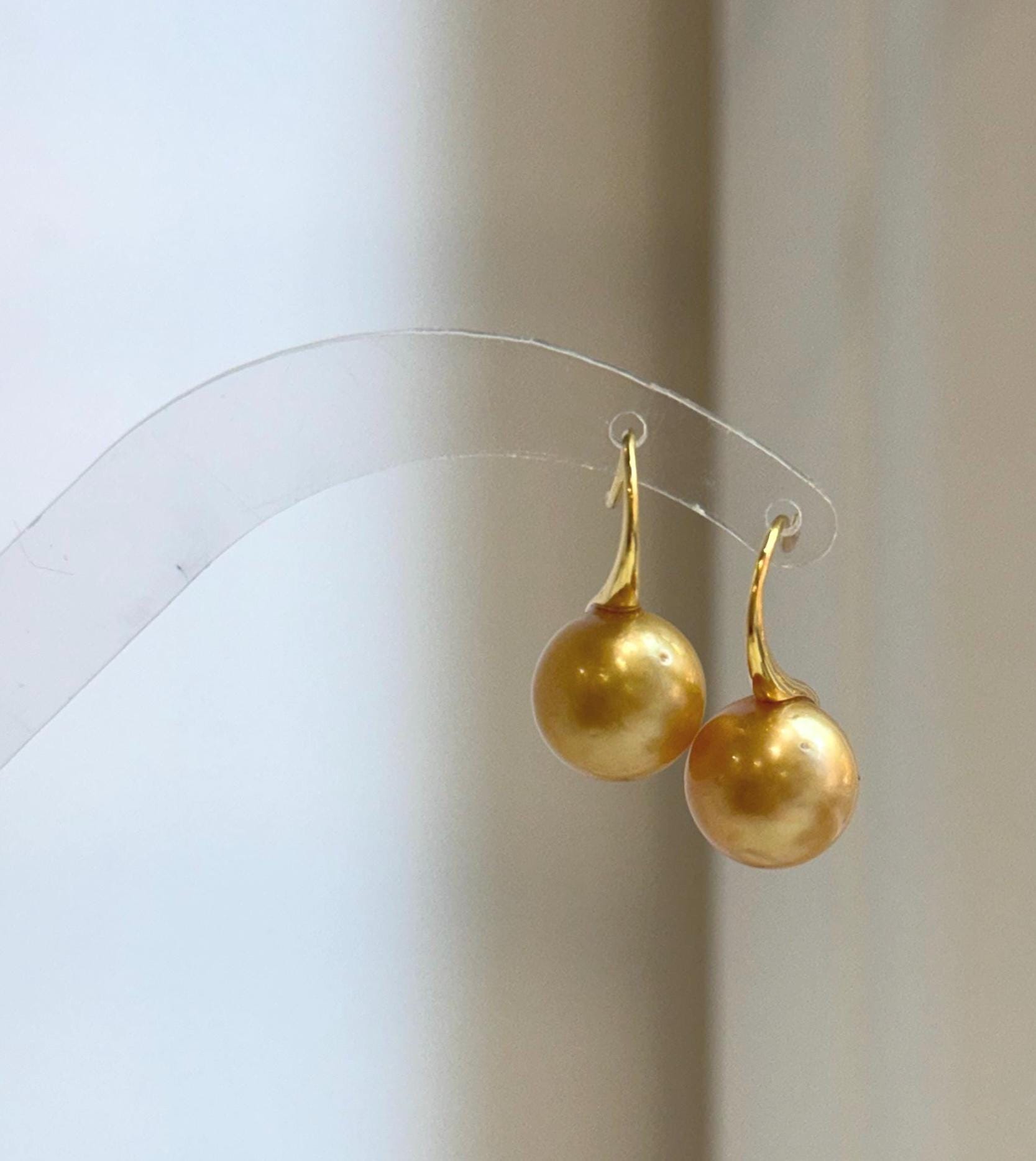 Elly’s 11.2mm Genius South sea deep golden ocean Pearls Earrings hooks: Extreme luster mirrored, 2.2cm high, S925 silver earrings.