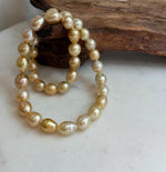 Elly’s 8.4-11.9mm 35pcs Genius natural South sea Golden Ocean Pearls Necklace: Extreme luster, 17.5” knotted, S925 silver necklace strand.