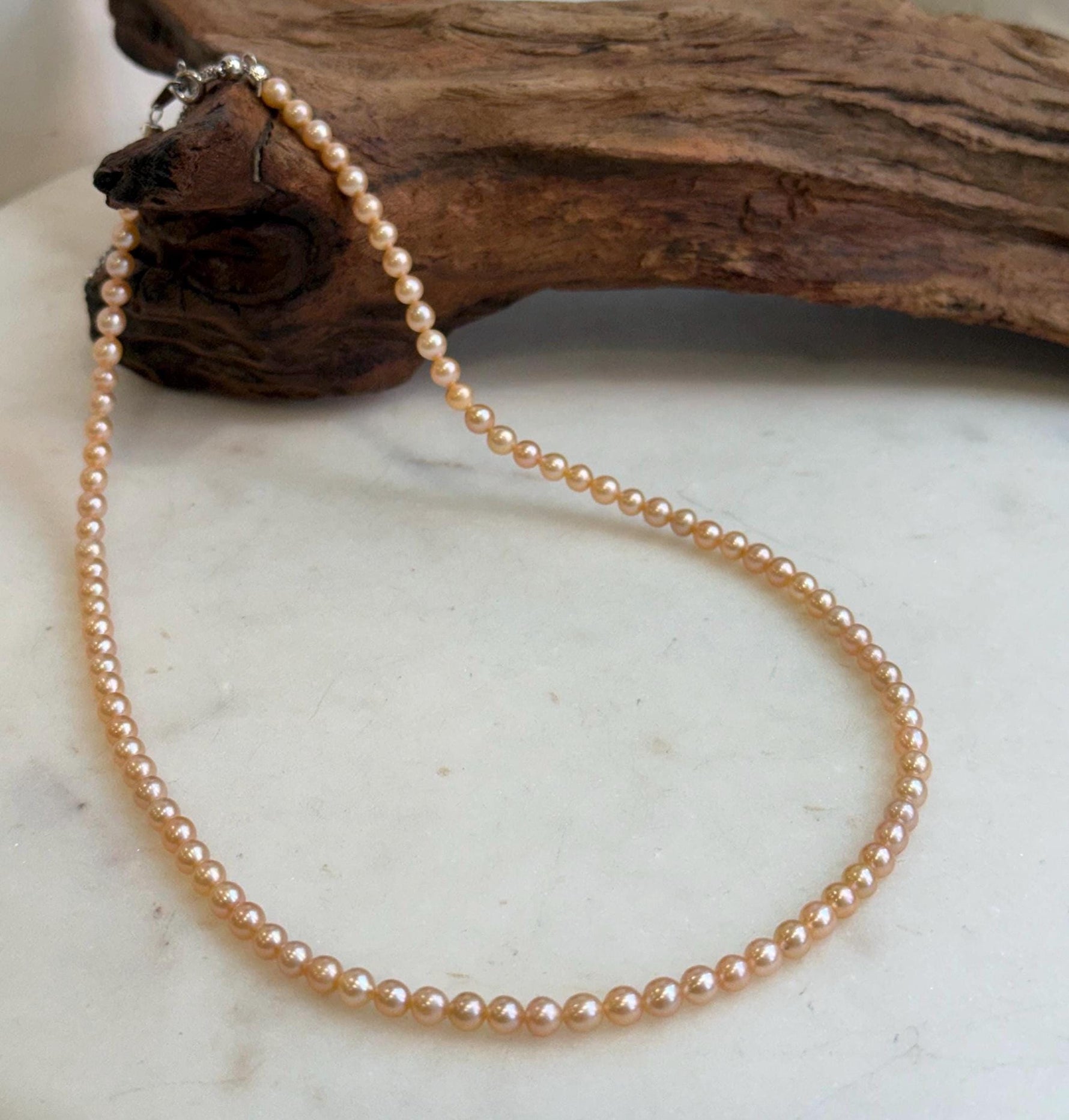 Elly’s 4.1-4.3mm Freshwater Peach gold Pearls Necklace: Extreme luster mirrored, To 18.1”, S925 silver necklace strand.