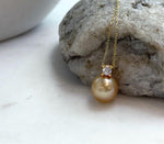 Elly’s 10.9mm South Sea deep Gold ocean Pearl pendant: Extreme luster mirrored, 1.5cm high, S925 silver w/ gold plated pendant.