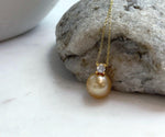 Elly’s 10.9mm South Sea deep Gold ocean Pearl pendant: Extreme luster mirrored, 1.5cm high, S925 silver w/ gold plated pendant.