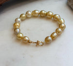 Elly’s 8.9-11.2mm 16pcs Genius South sea golden Ocean Pearls bracelet: Extreme luster, 8.1”, S925 silver bracelet.