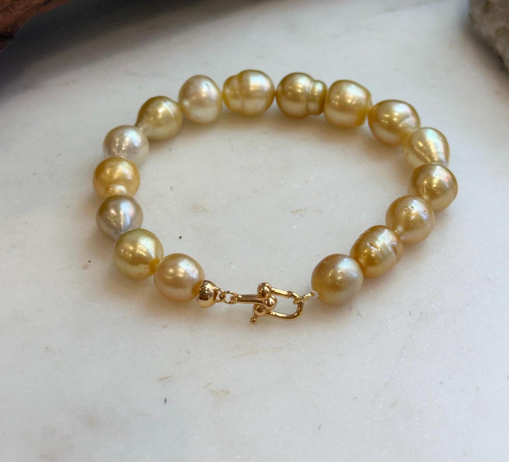 Elly’s 8.9-11.2mm 16pcs Genius South sea golden Ocean Pearls bracelet: Extreme luster, 8.1”, S925 silver bracelet.