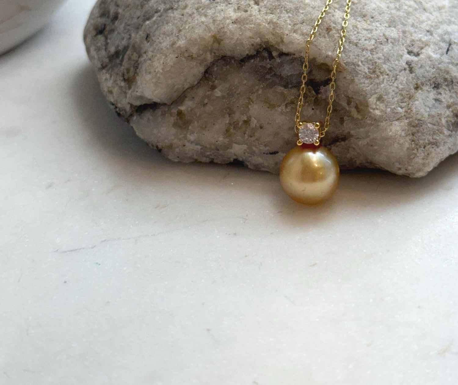 Elly’s 10.9mm South Sea deep tea Gold ocean Pearl pendant: Extreme luster mirrored, 1.5cm high, S925 silver w/ gold plated pendant.