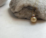 Elly’s 10.9mm South Sea deep tea Gold ocean Pearl pendant: Extreme luster mirrored, 1.5cm high, S925 silver w/ gold plated pendant.