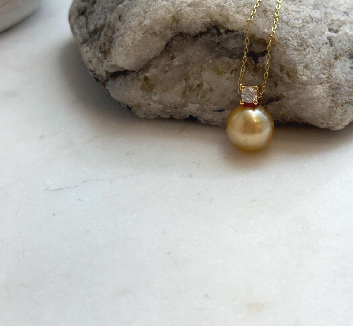 Elly’s 10.9mm South Sea deep tea Gold ocean Pearl pendant: Extreme luster mirrored, 1.5cm high, S925 silver w/ gold plated pendant.