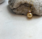 Elly’s 10.9mm South Sea deep tea Gold ocean Pearl pendant: Extreme luster mirrored, 1.5cm high, S925 silver w/ gold plated pendant.