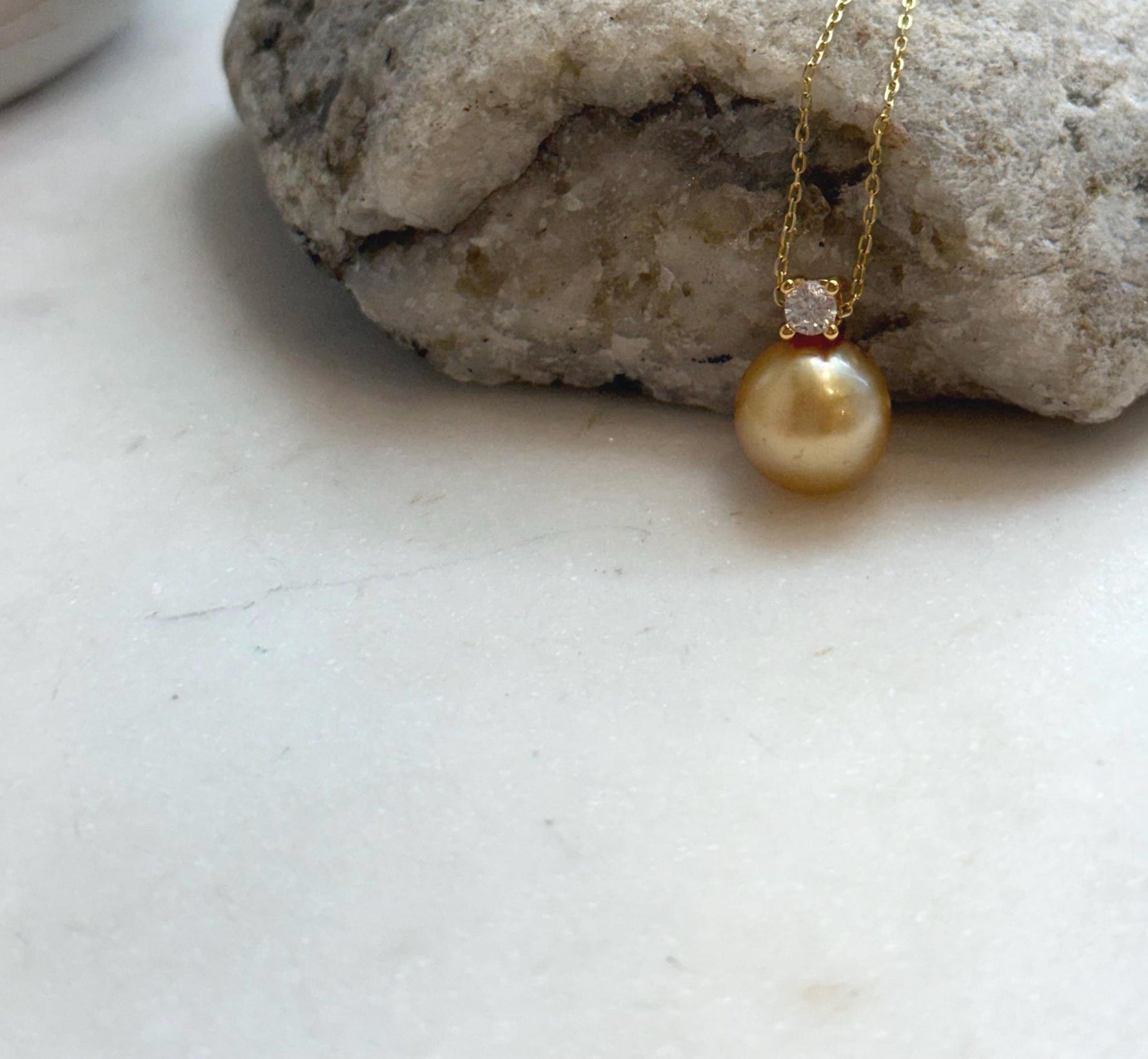 Elly’s 10.9mm South Sea deep tea Gold ocean Pearl pendant: Extreme luster mirrored, 1.5cm high, S925 silver w/ gold plated pendant.