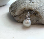 Elly’s 13.4mm South Sea White ocean Pearl pendant: Extreme luster mirrored, 2.4cm high, S925 silver w/ gold plated pendant.