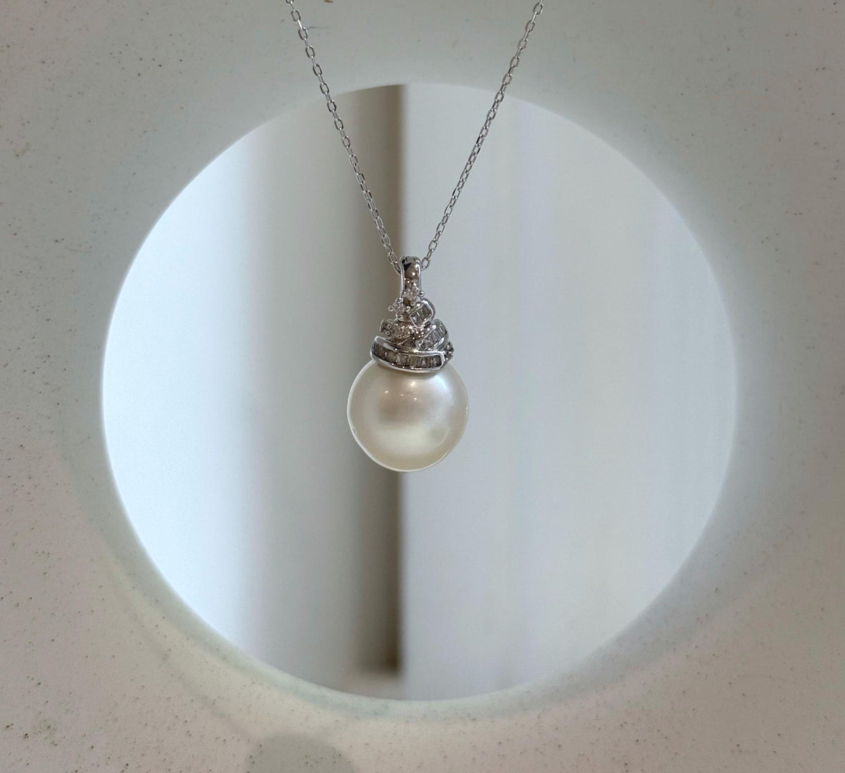 Elly’s 13.4mm South Sea White ocean Pearl pendant: Extreme luster mirrored, 2.4cm high, S925 silver w/ gold plated pendant.