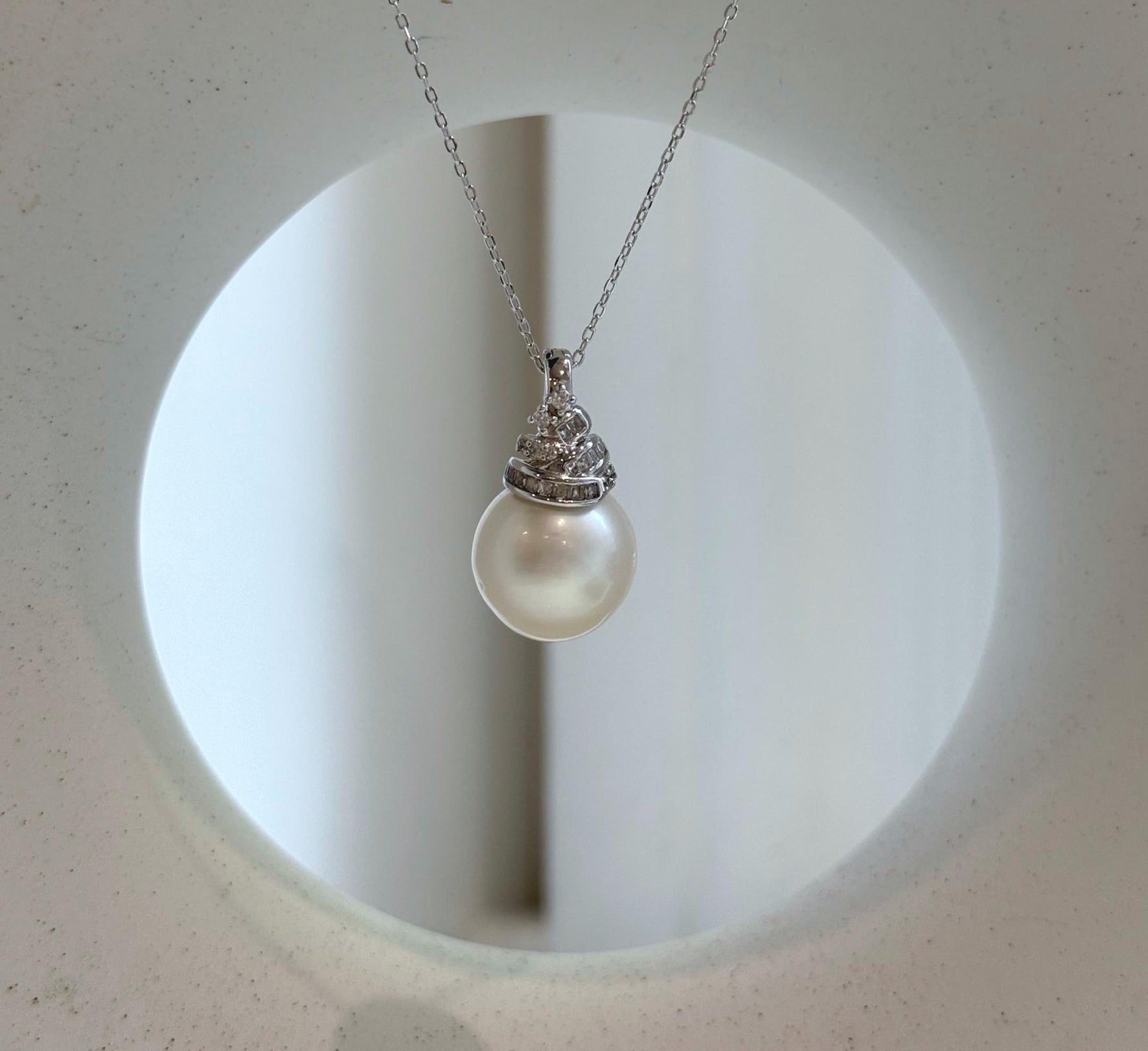 Elly’s 13.4mm South Sea White ocean Pearl pendant: Extreme luster mirrored, 2.4cm high, S925 silver w/ gold plated pendant.