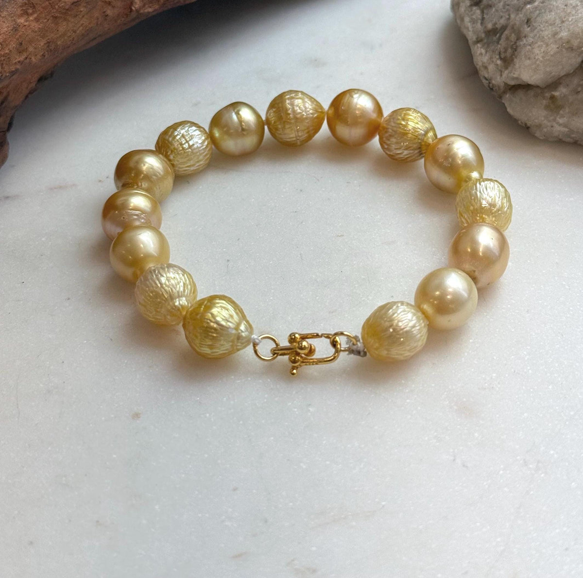 Elly’s 10.3-12.3mm 15pcs Genius South sea golden Ocean Pearls bracelet: Extreme luster, 8.3”, S925 silver bracelet.