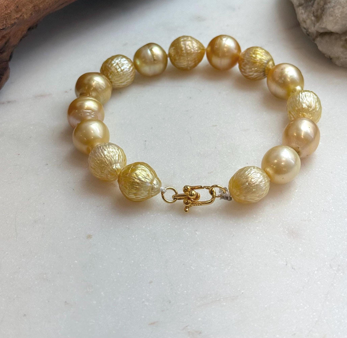 Elly’s 10.3-12.3mm 15pcs Genius South sea golden Ocean Pearls bracelet: Extreme luster, 8.3”, S925 silver bracelet.