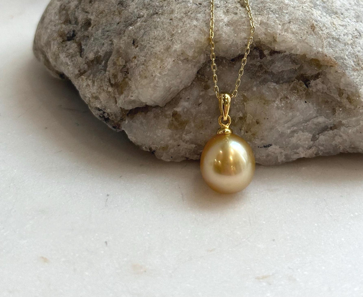 Elly’s 10.6mm South Sea deep tea Gold ocean Pearl pendant: Extreme luster mirrored, 1.9cm high, S925 silver w/ gold plated pendant.