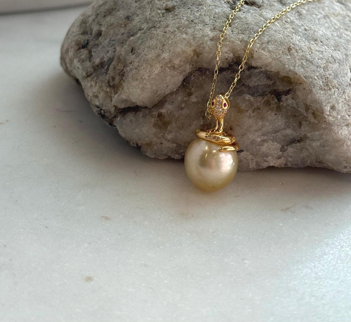 Elly’s 11.6mm South Sea Gold iridescent ocean Pearl Snake pendant: Extreme luster mirrored, 2.1cm high, S925 silver pendant.