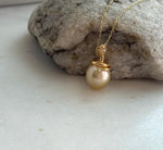 Elly’s 11.6mm South Sea Gold iridescent ocean Pearl Snake pendant: Extreme luster mirrored, 2.1cm high, S925 silver pendant.