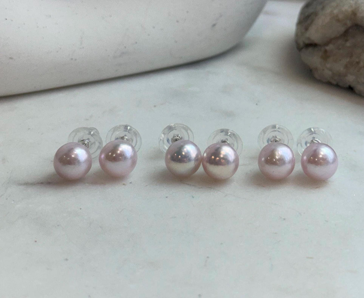 Genuine 9.6mm Edison pale pink pearl stud earrings with mirror luster