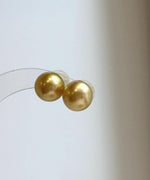 Natural South Sea ocean pearl earrings in rich deep tea gold color.