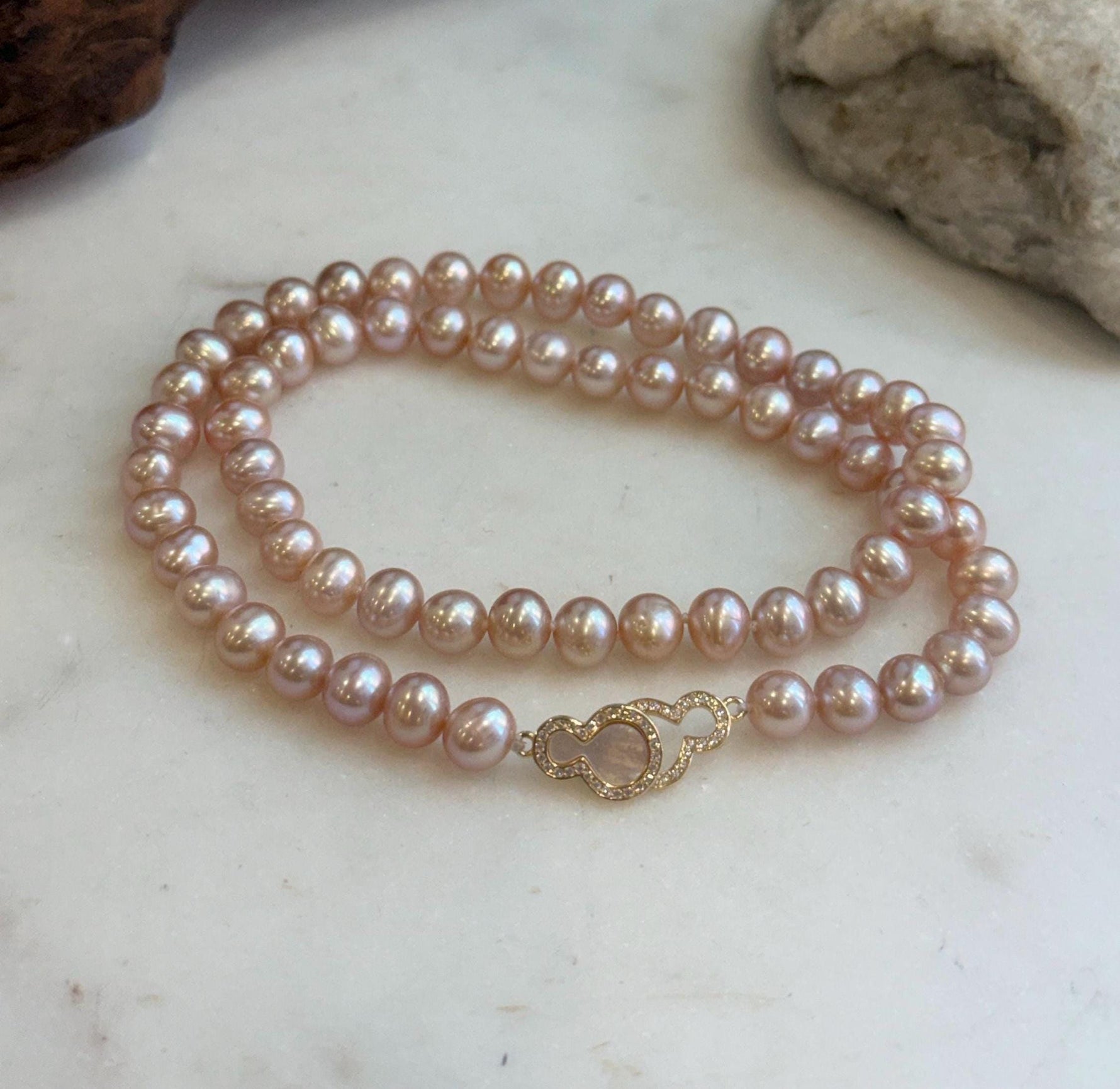 Real freshwater pearl strand in soft rose color for everyday wear