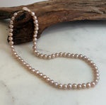 Bridal rose pearl necklace featuring genuine freshwater pearls