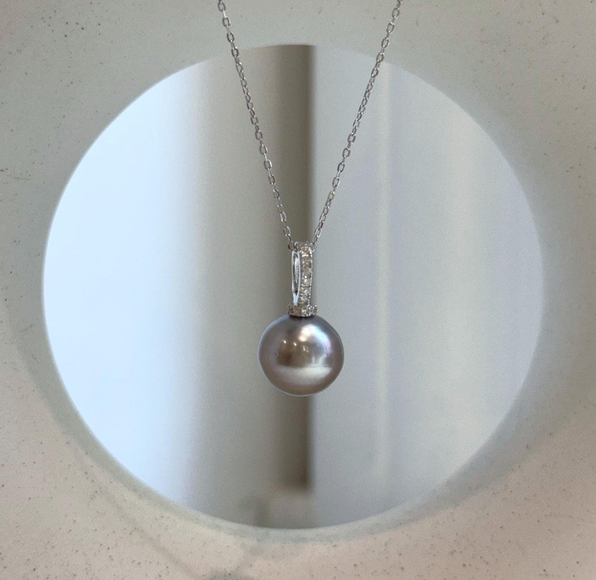 Elly’s 12mm Tahitian platinum ocean Pearl pendant: Extreme luster mirrored, S925 silver minimalist pendant, 2.1cm high.