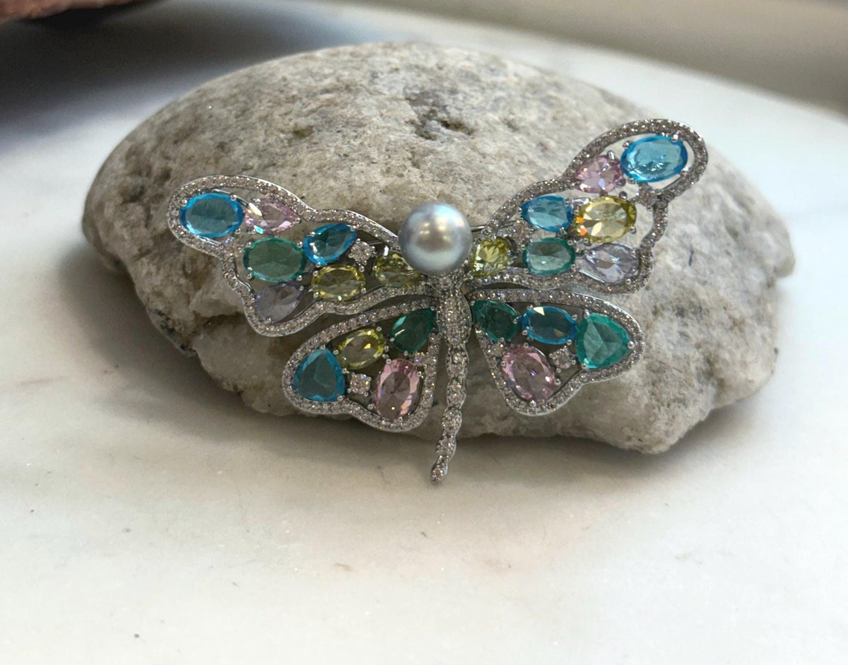 Natural blue silver Akoya pearl brooch close up