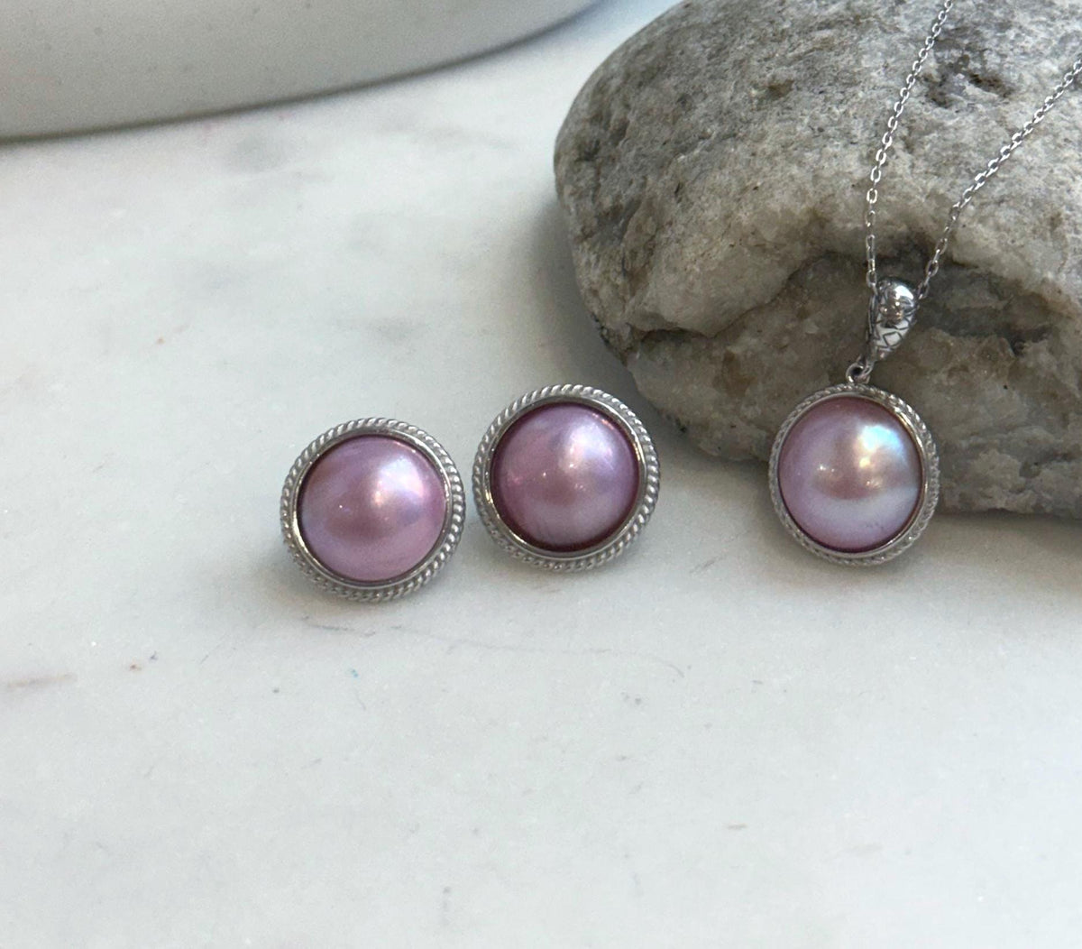 Strong luster pink Mabe pearls in sterling silver.