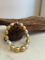 14 genuine ocean pearls bracelet with mirror-like luster.