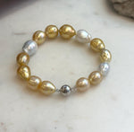 Genuine ocean pearl bracelet with sterling silver clasp.